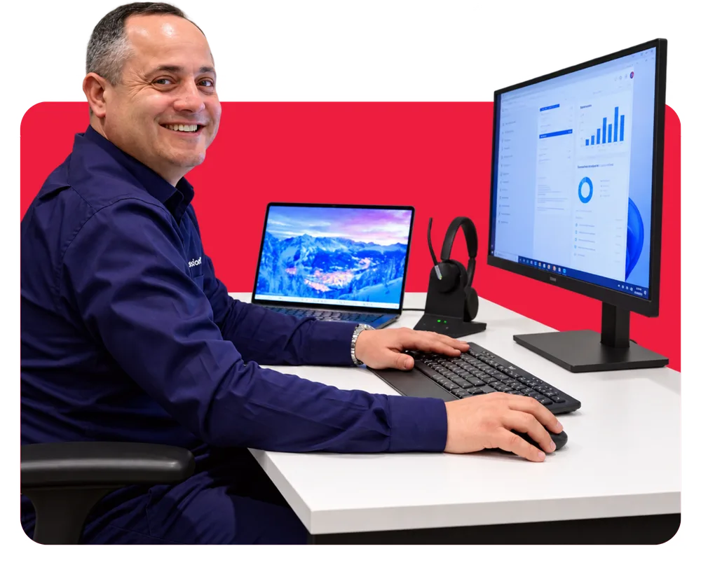 A FusionRed team member at his desk